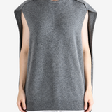Grey dress worn by a person, showing the dress fit