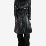 Black coat worn by a person, showing the coat's fit