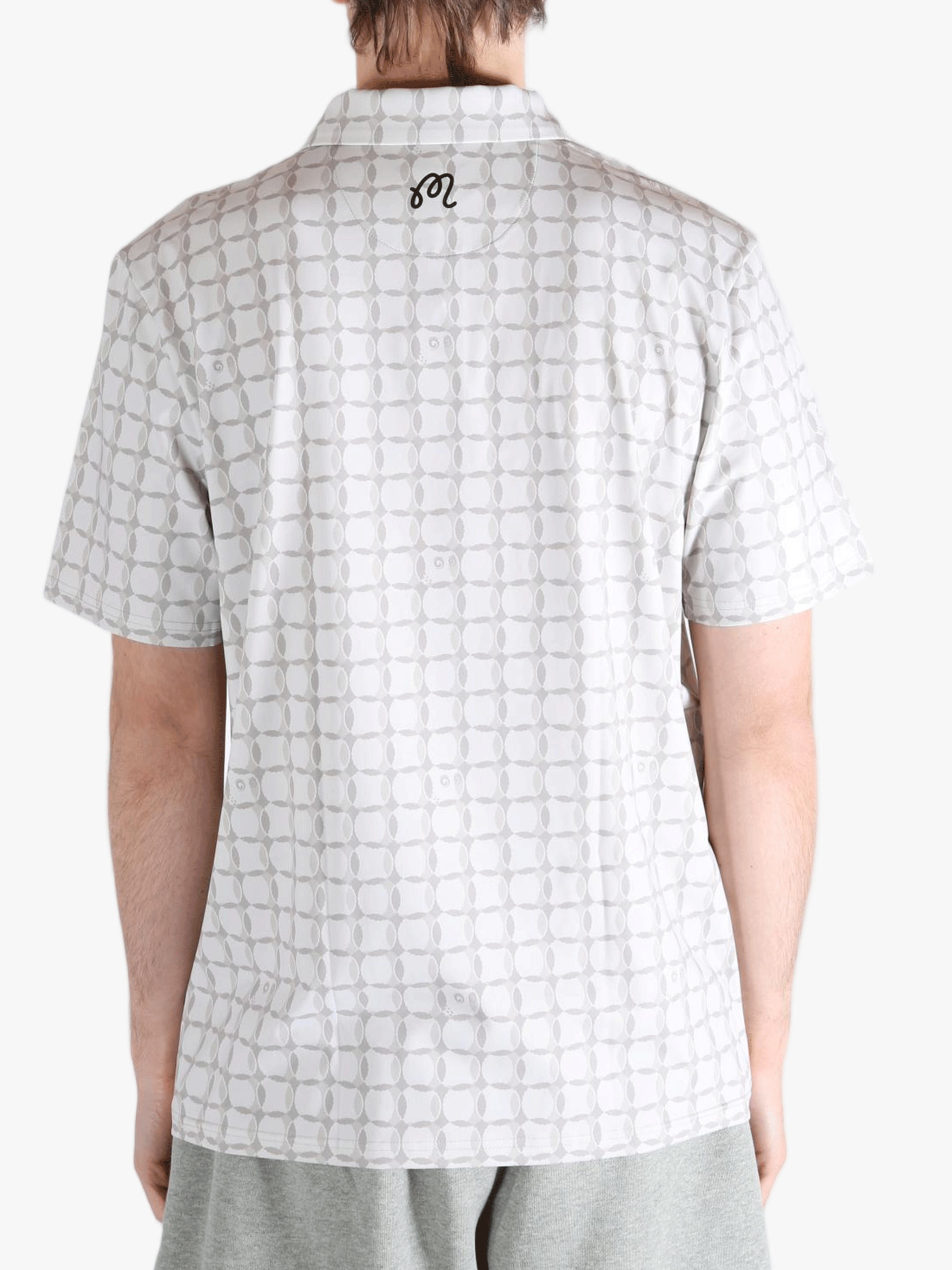 Grey shirt worn by a person, showing the shirt's fit