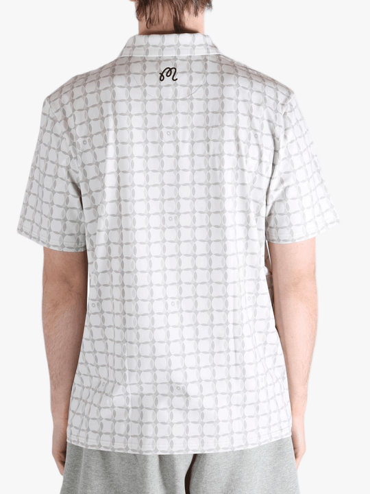 Grey shirt worn by a person, showing the shirt's fit