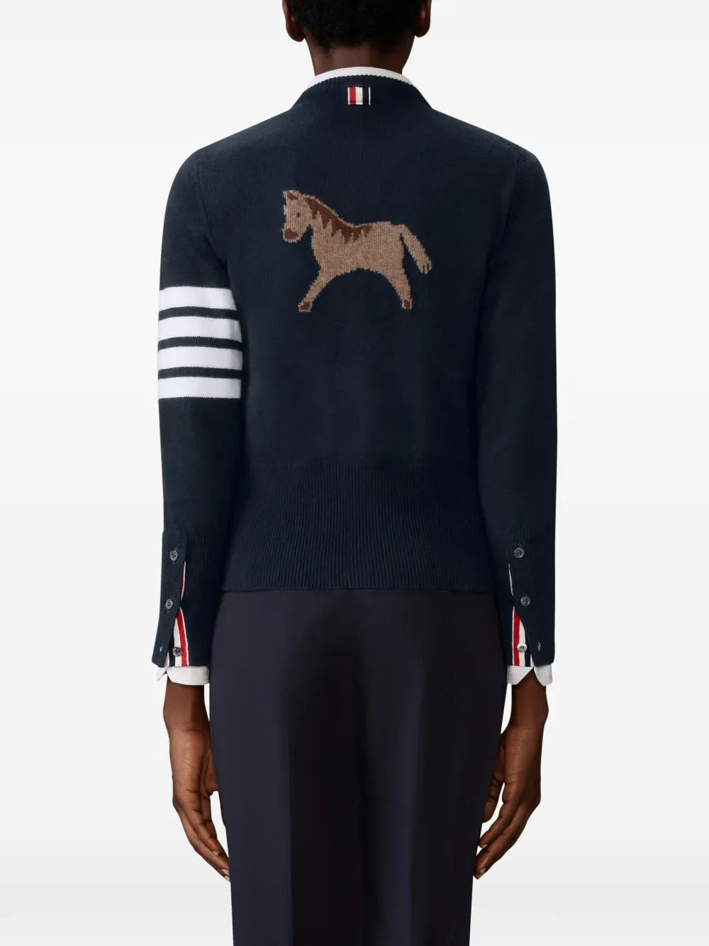 Navy cardigan worn by a person, showing the cardigan's fit