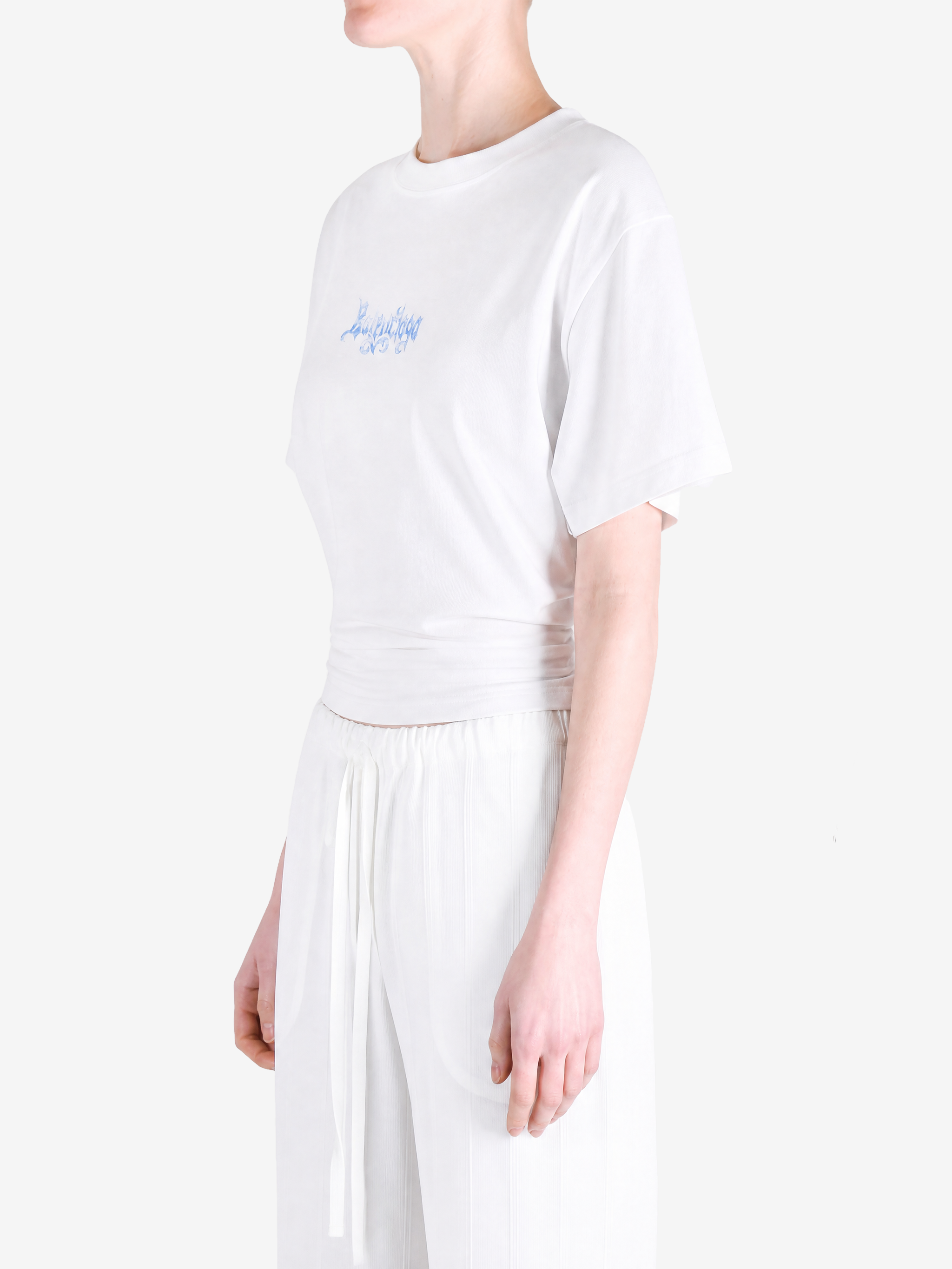 White t-shirt worn by a person, showing the t-shirt fit
