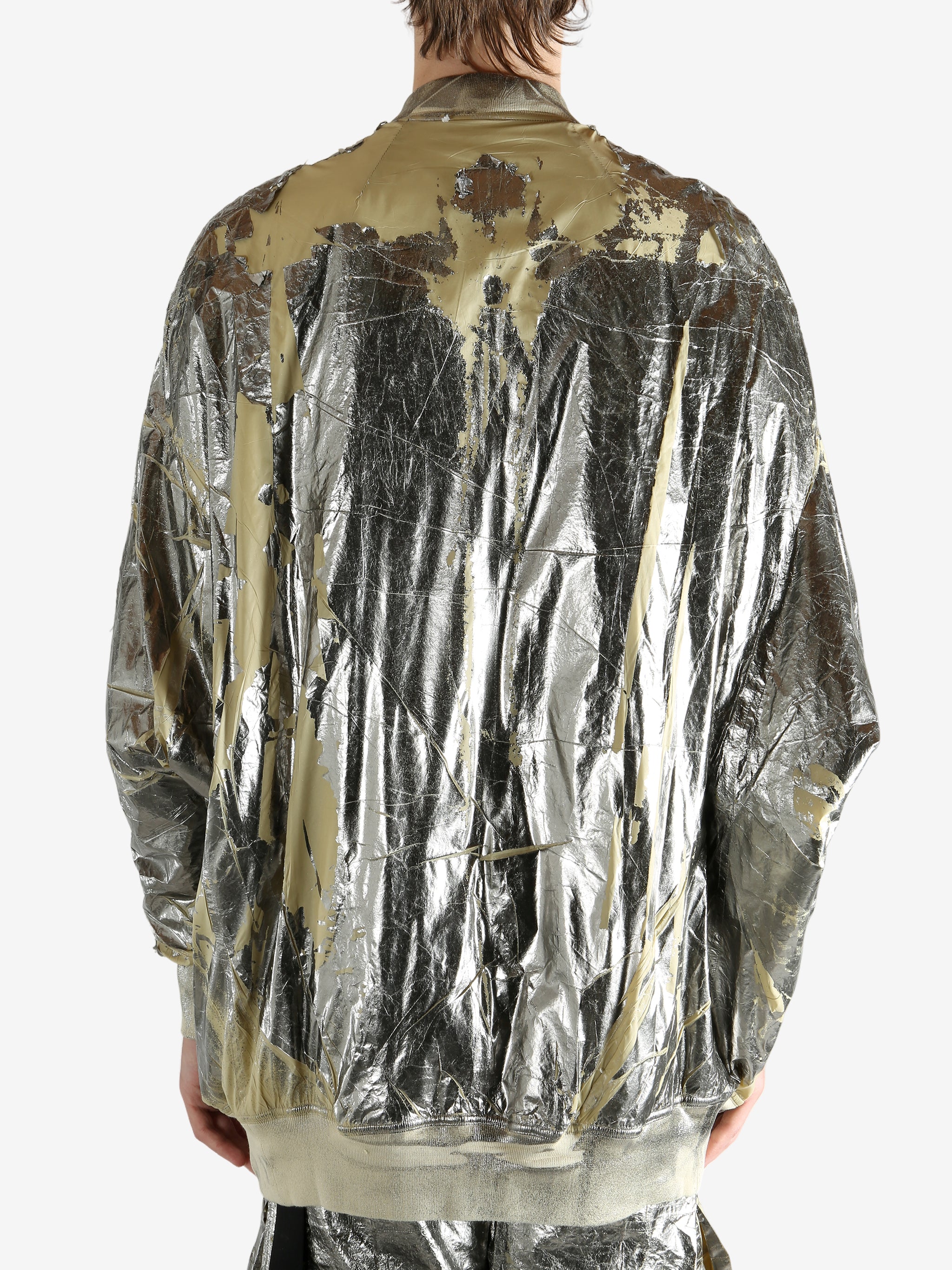 Yellow jacket worn by a person, showing the jacket's fit