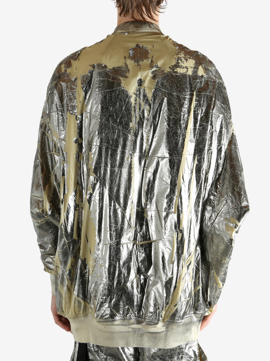 Yellow jacket worn by a person, showing the jacket's fit