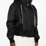 Black jacket worn by a person, showing the jacket's fit