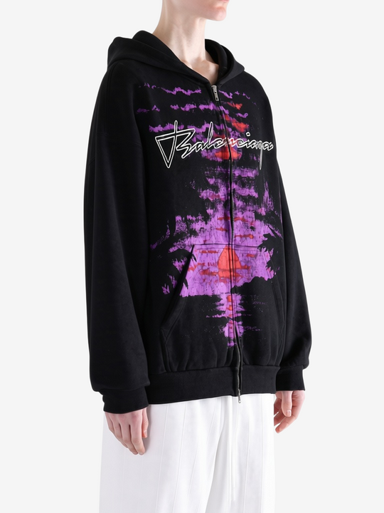 Black hoodie worn by a person, showing the hoodie fit