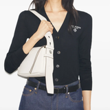 White bags worn by a person, showing the bgas's fit