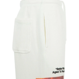 Close up of the white pants, showing  texture of the cotton