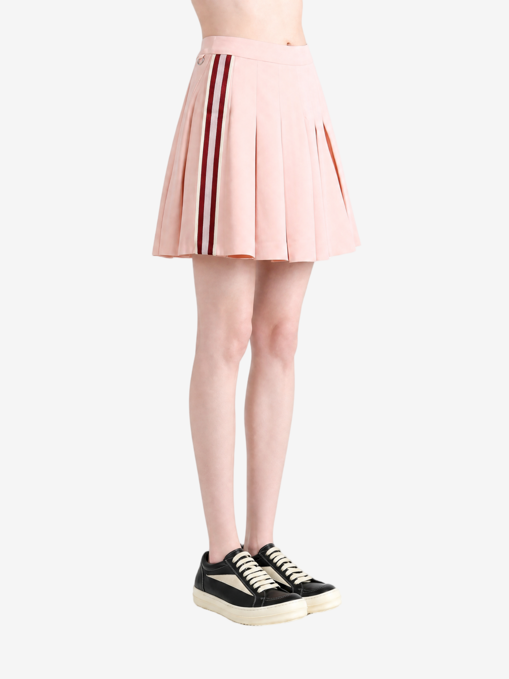 Pink skirt worn by a person, showing the skirt fit