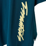 Close up of Green t-shirt, showing texture of the 100% cotton fabric