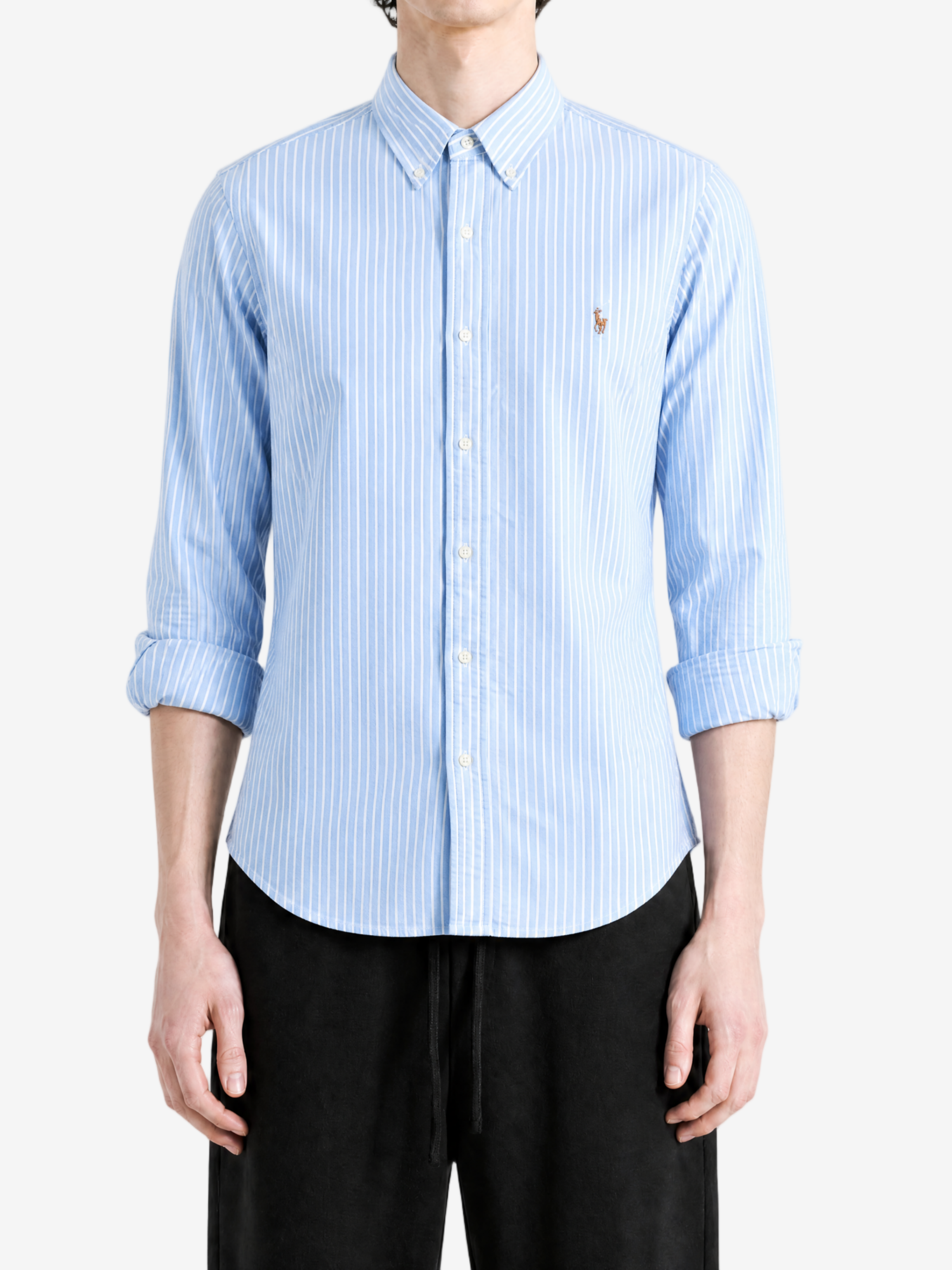 Blue shirt worn by a person, showing the shirt fit