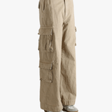 Brown pants worn by a person, showing the pants' fit