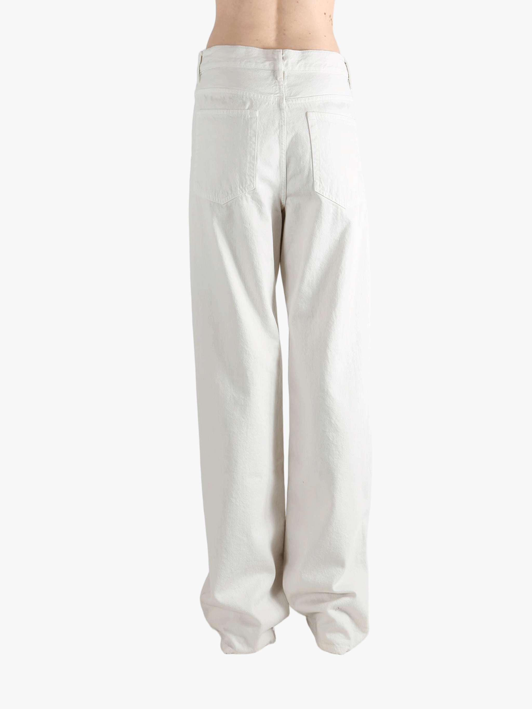 White pant worn by a person, showing the pant's fit