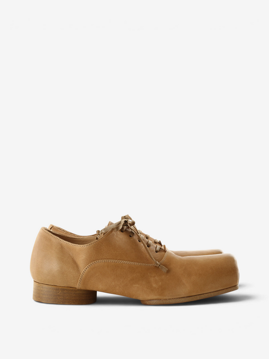 Tan shoes, side view