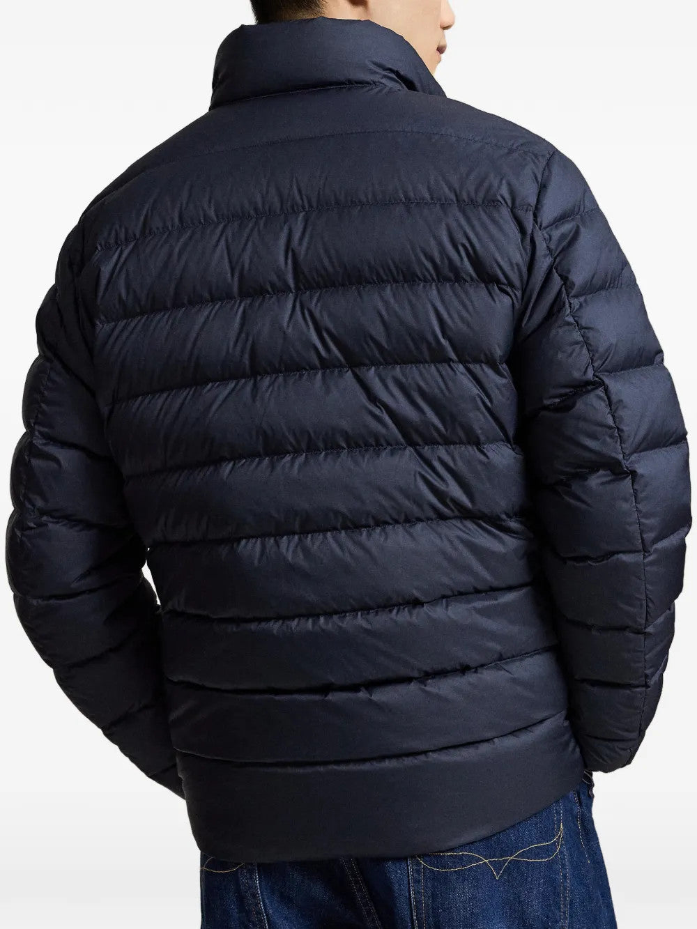 Navy jacket worn by a person, showing the jacket fit
