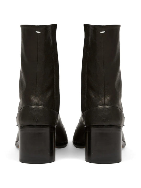 Black boots, back view