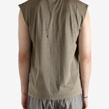 Brown shirt worn by a person, showing the shirt fit