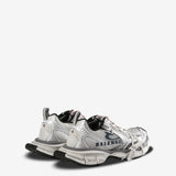 Grey sneakers, side view