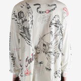 White t-shirts worn by a person, showing the t-shirts fit