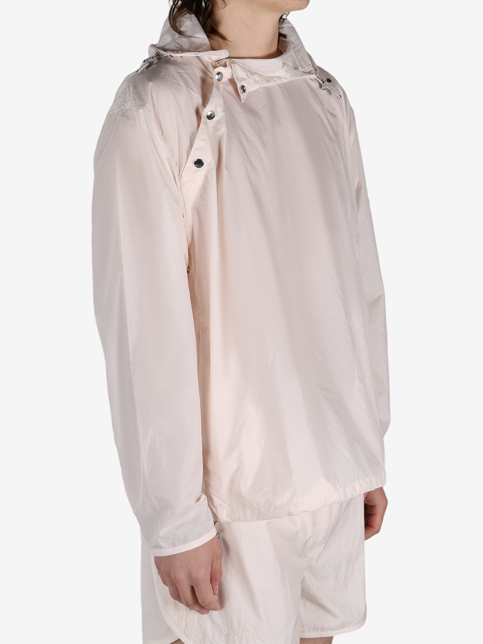 Pink jacket worn by a person, showing the jacket's fit