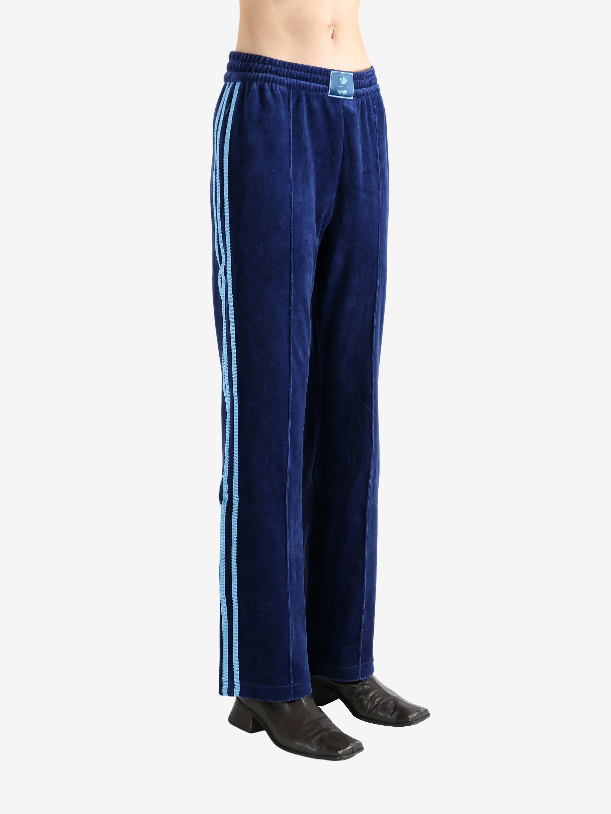 Blue pants worn by a person, showing the pants' fit