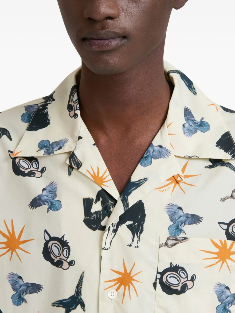 Close up of tan shirts, showing texture of the cotton fabric