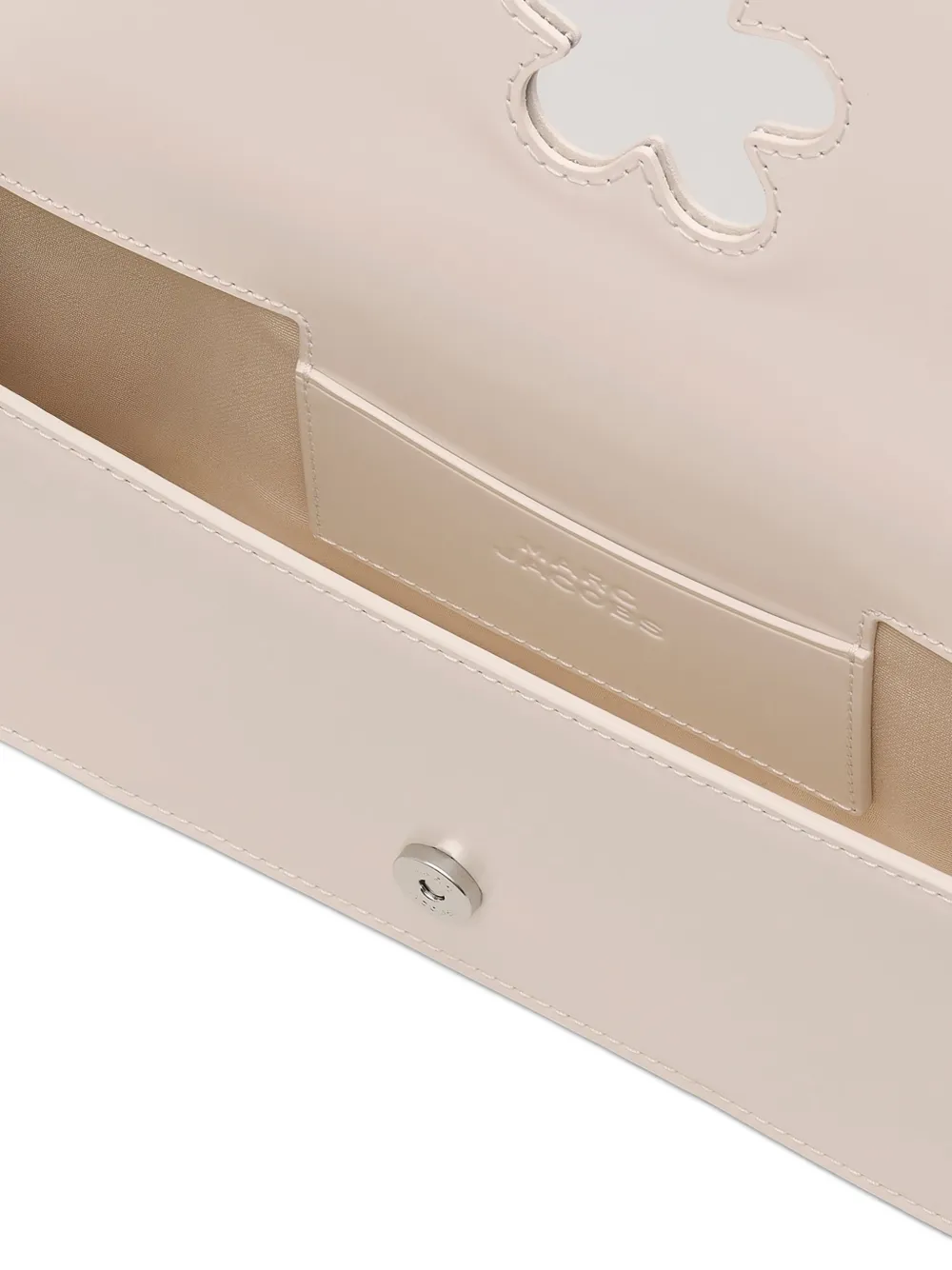 Close up of white bags,showing texture of the leather fabric.