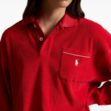 Close up of red knitwear, showing texture of the Cotton and Polyester fabric