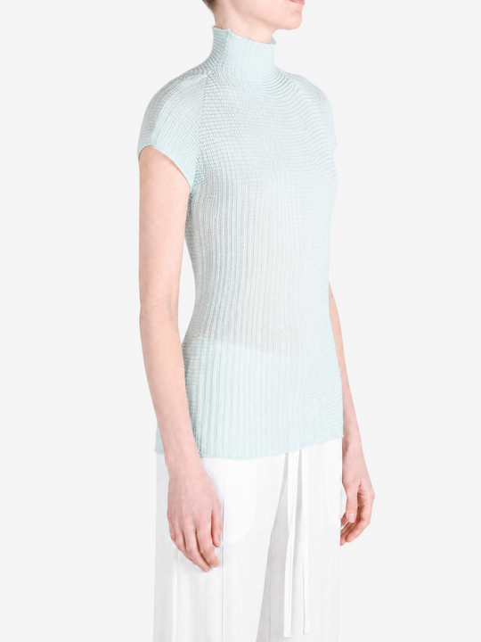 Blue shirt worn by a person, showing the shirt fit