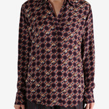 Red shirt worn by a person, showing the shirt fit