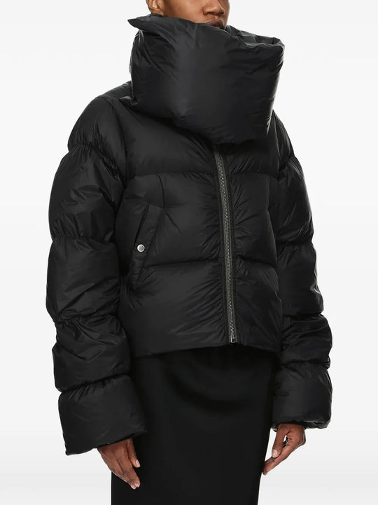 Black jacket worn by a person, showing the jacket fit