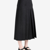 Black pants worn by a person, showing the pants fit