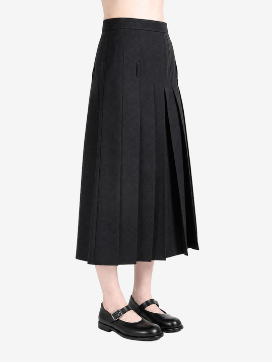 Black pants worn by a person, showing the pants fit