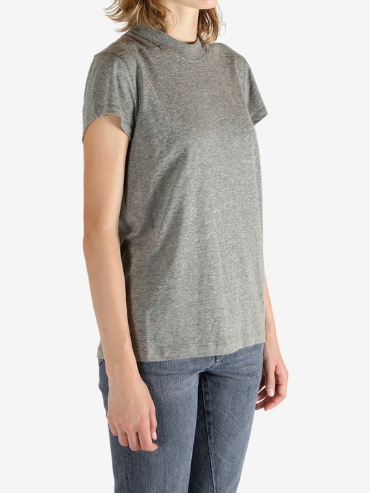 Grey t-shirt worn by a person, showing the shirt's fit