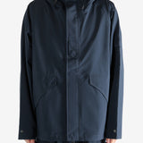 Navy jacket worn by a person, showing the jacket's fit