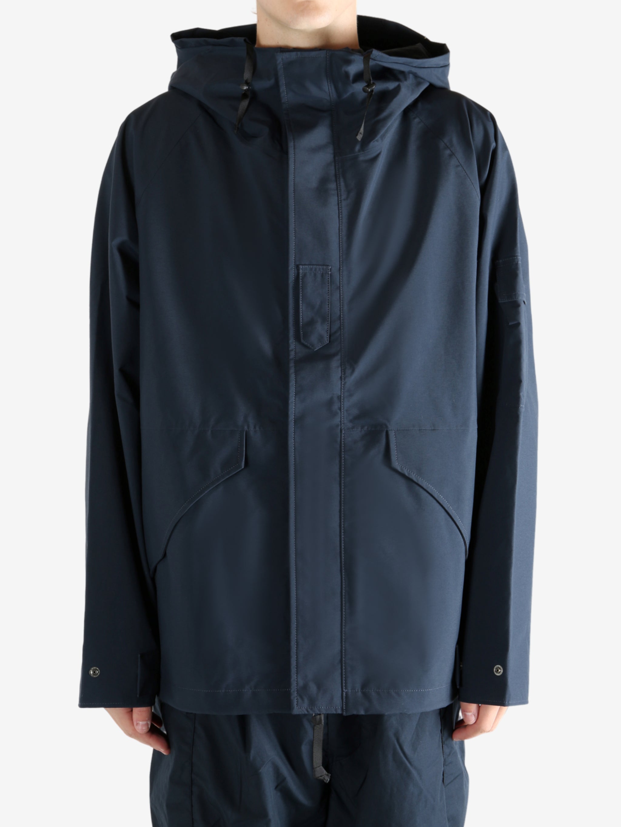 Navy jacket worn by a person, showing the jacket's fit