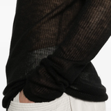 Black t-shirt worn by a person, showing the t-shirt fit
