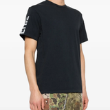 Black t-shirt worn by a person, showing the t-shirt fit