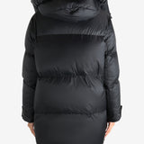 Black jacket worn by a person, showing the jacket's fit