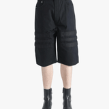 Black shorts worn by a person, showing the shorts's fit