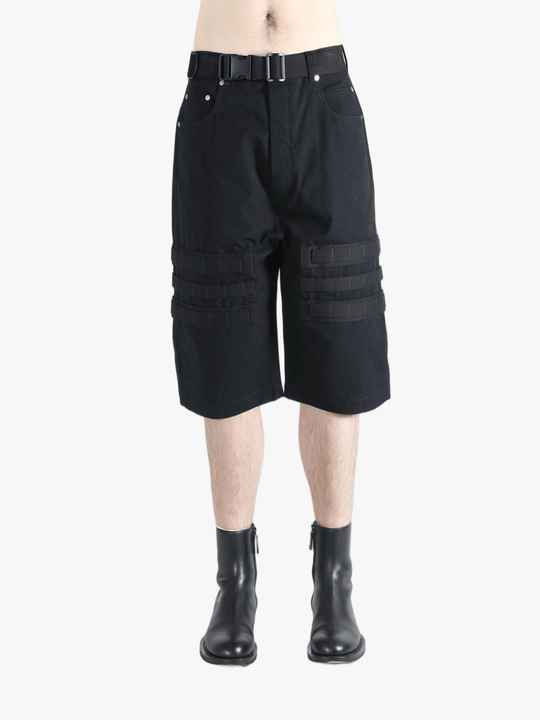 Black shorts worn by a person, showing the shorts's fit