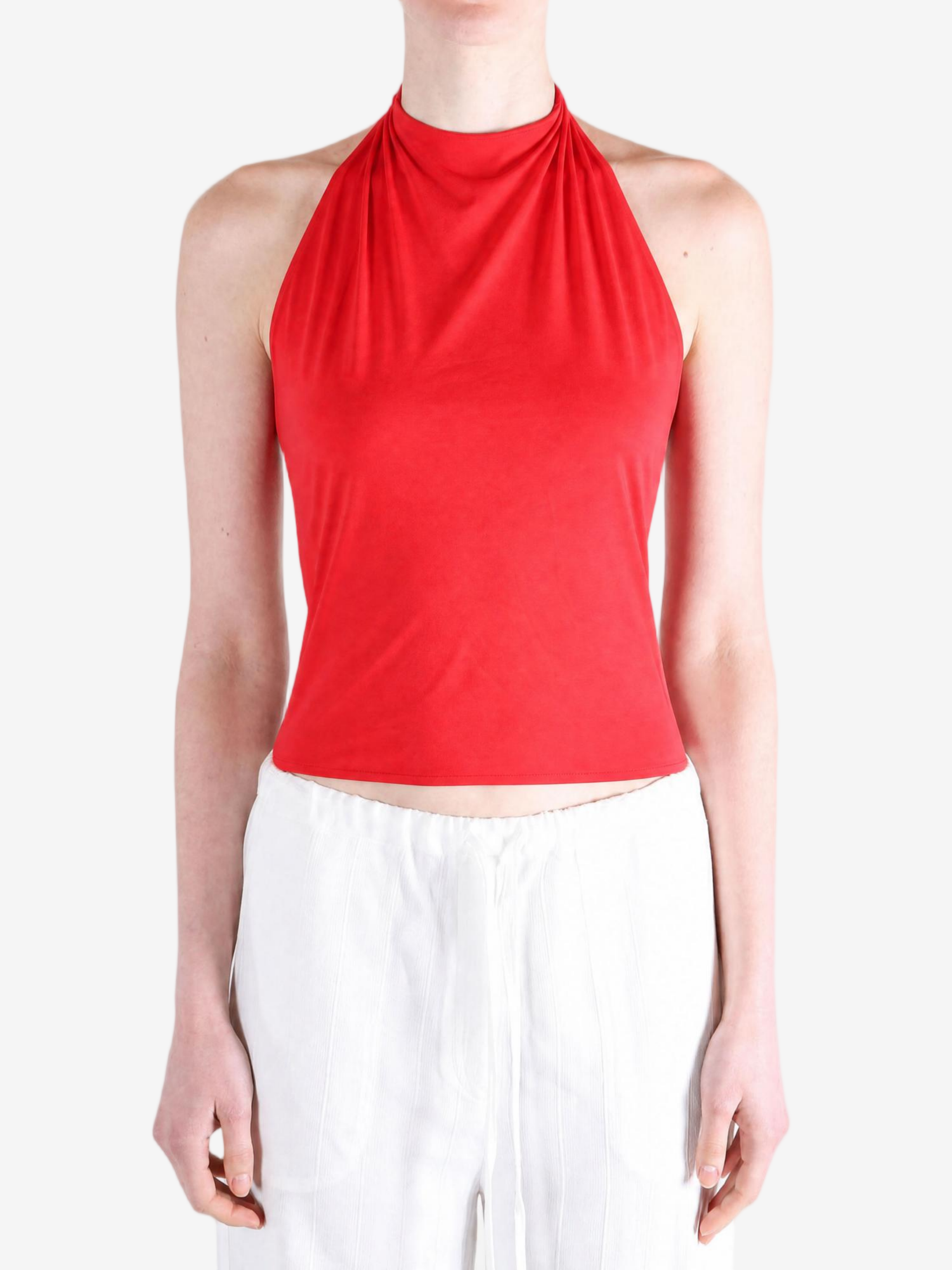 Red top worn by a person, showing the top fit
