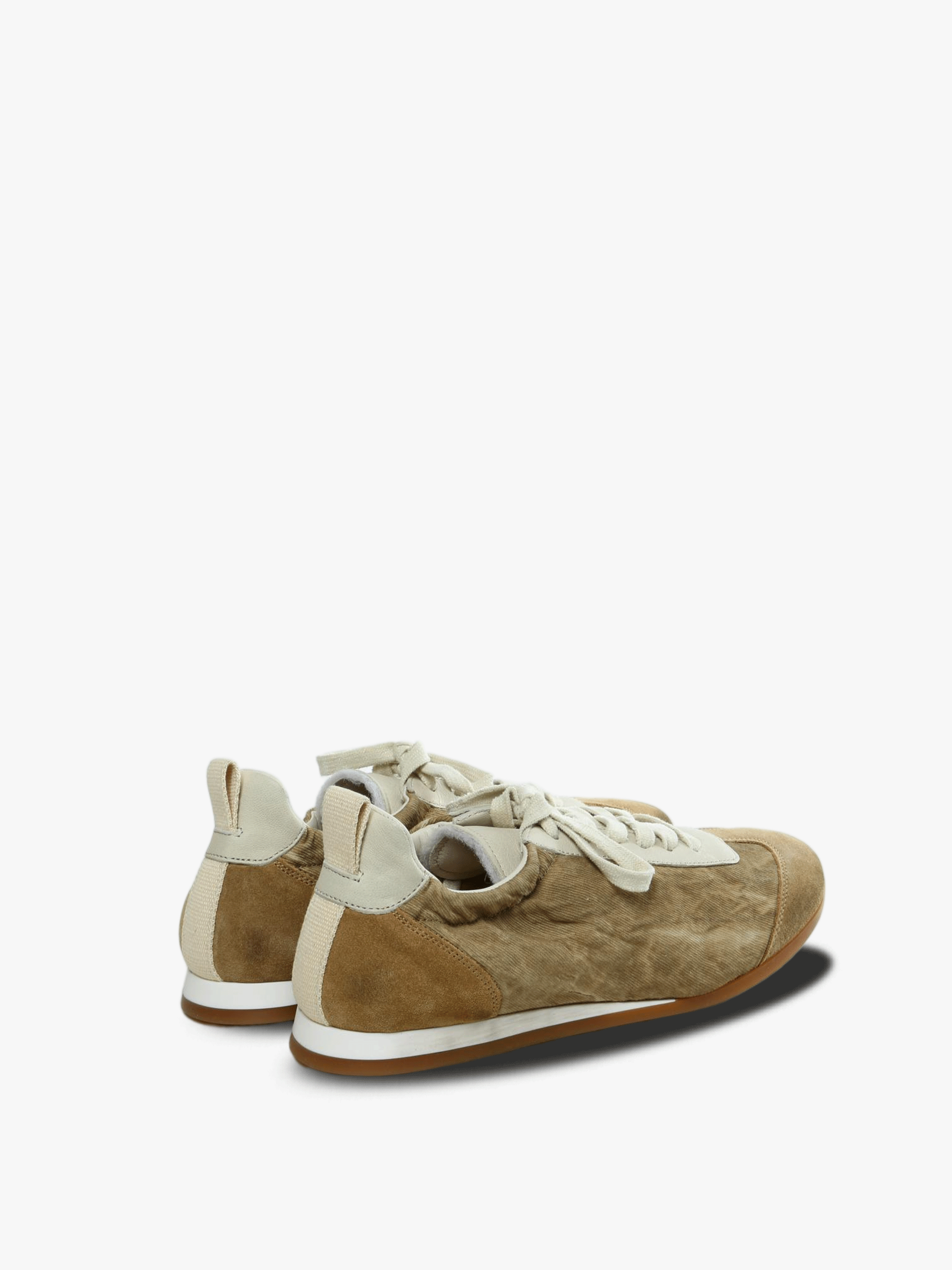 Tan sneakers, side view