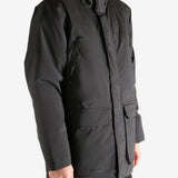 Black jacket worn by a person, showing the jacket's fit