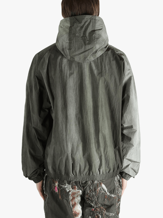 Grey jacket worn by a person, showing the jacket's fit