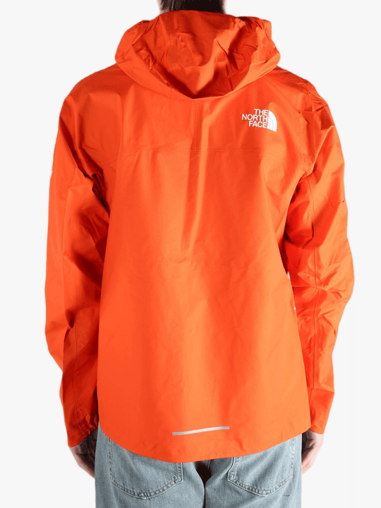 Red jacket worn by a person, showing the jacket fit