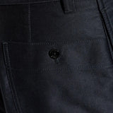 Close up of black pants, showing texture of the cotton fabric