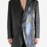 Black jacket worn by a person, showing the jacket's fit