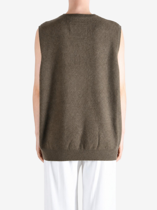Brown hoodie worn by a person, showing the hoodie fit
