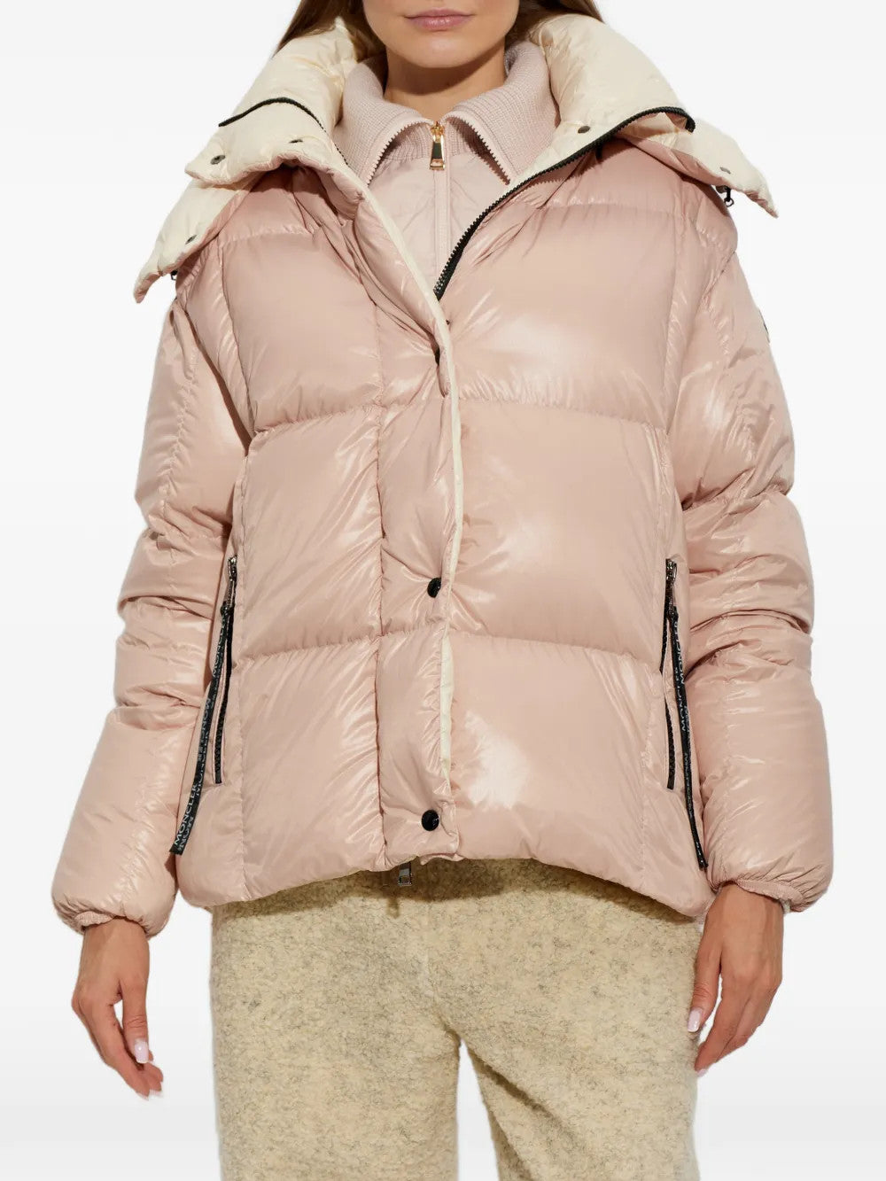 Pink jacket worn by a person, showing the jacket fit